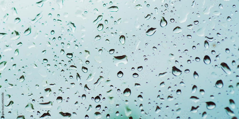 Rainy wet cold blue sky eco seasonal natural abstract background with water drops Rainy wet cold blue sky eco seasonal natural abstract background with water drops