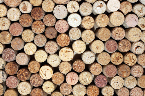 pattern of used wine bottles corks background closeup