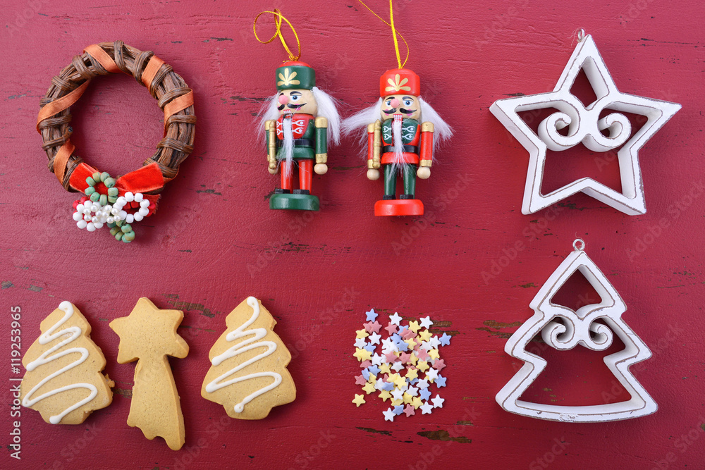 Christmas background with ornaments on red wood table. Christmas background with ornaments on red wood table.