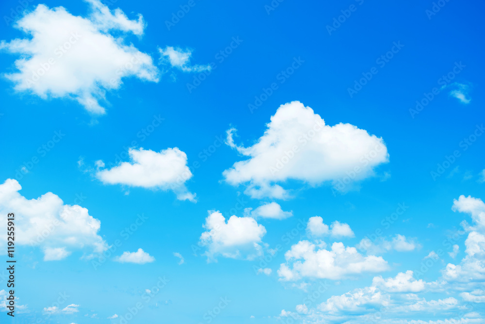 Blue sky with white clouds floating across the full sky. Blue sky with white clouds floating across the full sky.