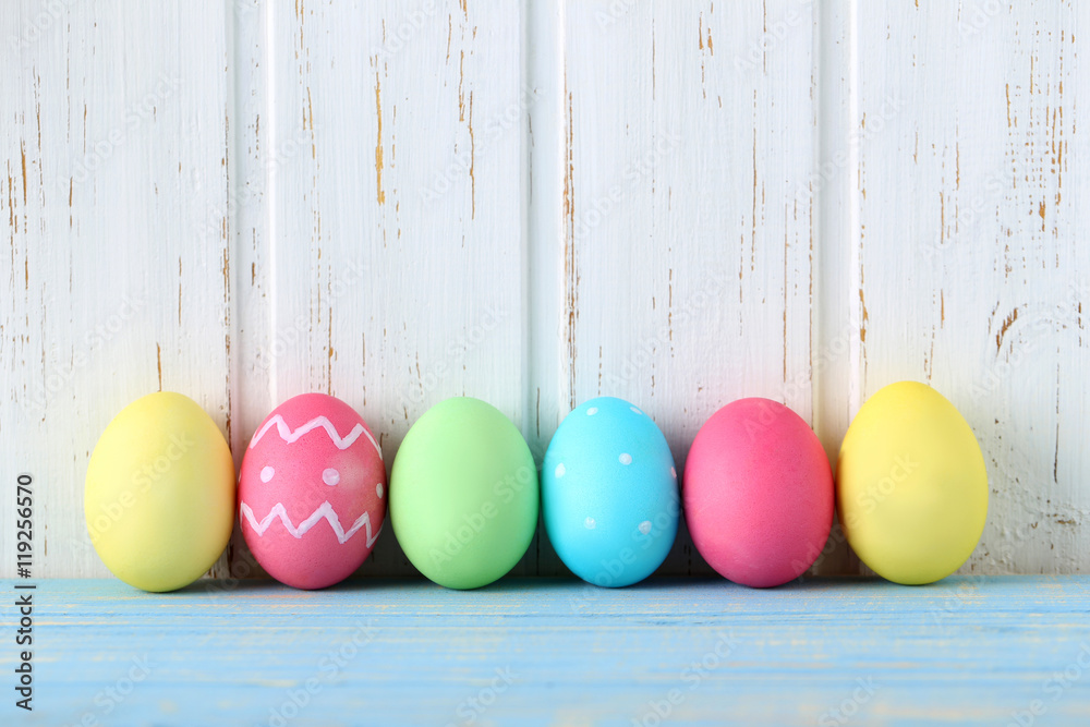 Easter eggs on a blue wooden table Easter eggs on a blue wooden table