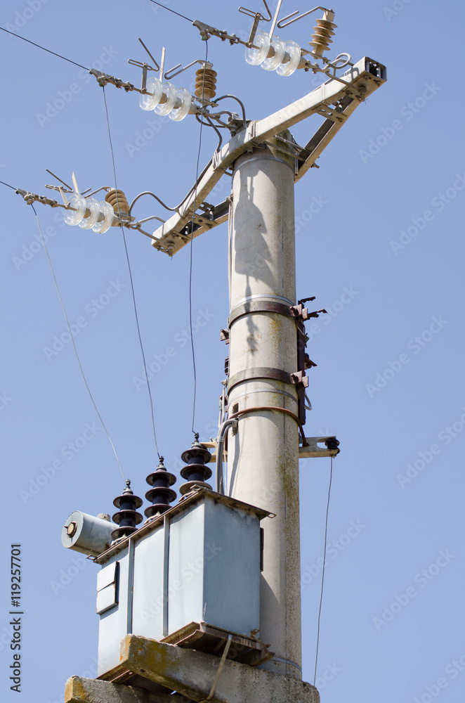 Electric transmission pylons. Close-up of insulators