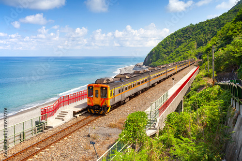 Train approaching the Duoliang Station in Taitung, Taiwan photo