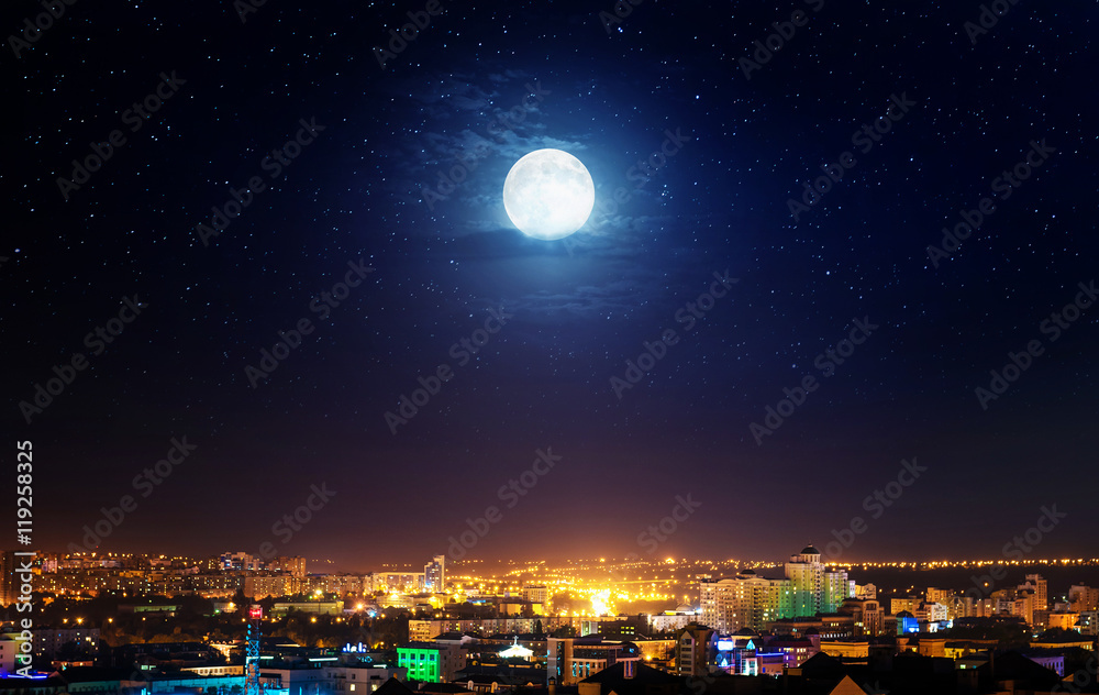 Obraz premium City landscape at nigh with moon. Elements of this image furnished by NASA.