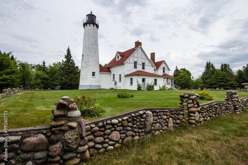 Point Iroquois Lighthouse.  The Point Iroquois Lighthouse is located on the Whitefish Bay Scenic Byway and is a popular attraction in the Hiawatha National Forest. Bay Mills, Michigan.