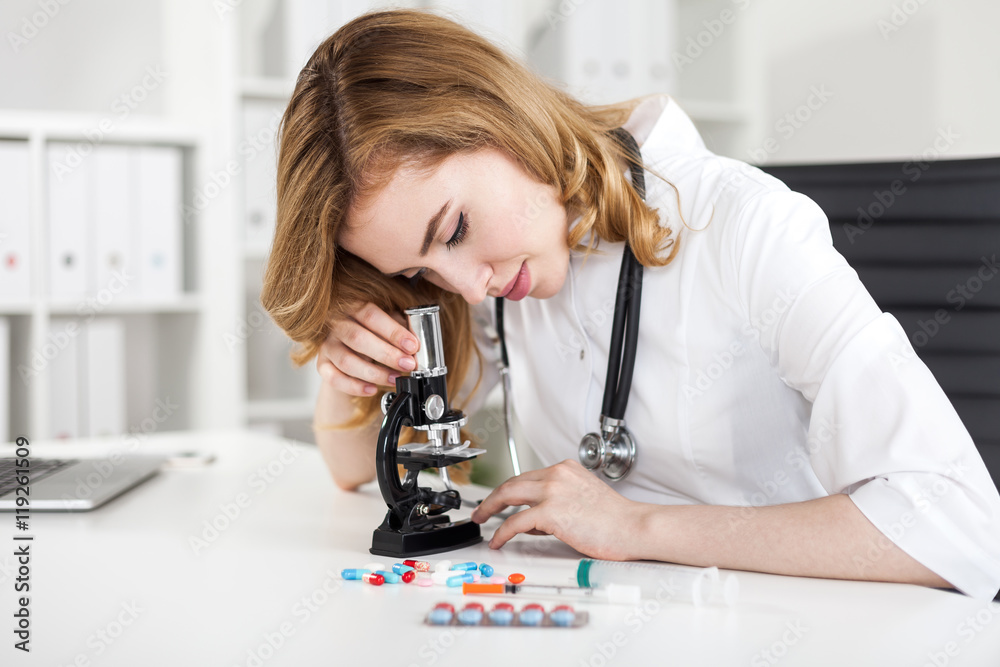Pharmacist working in lab
