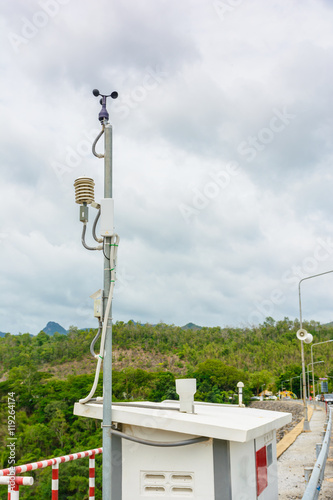 wind meter and mountain background photo