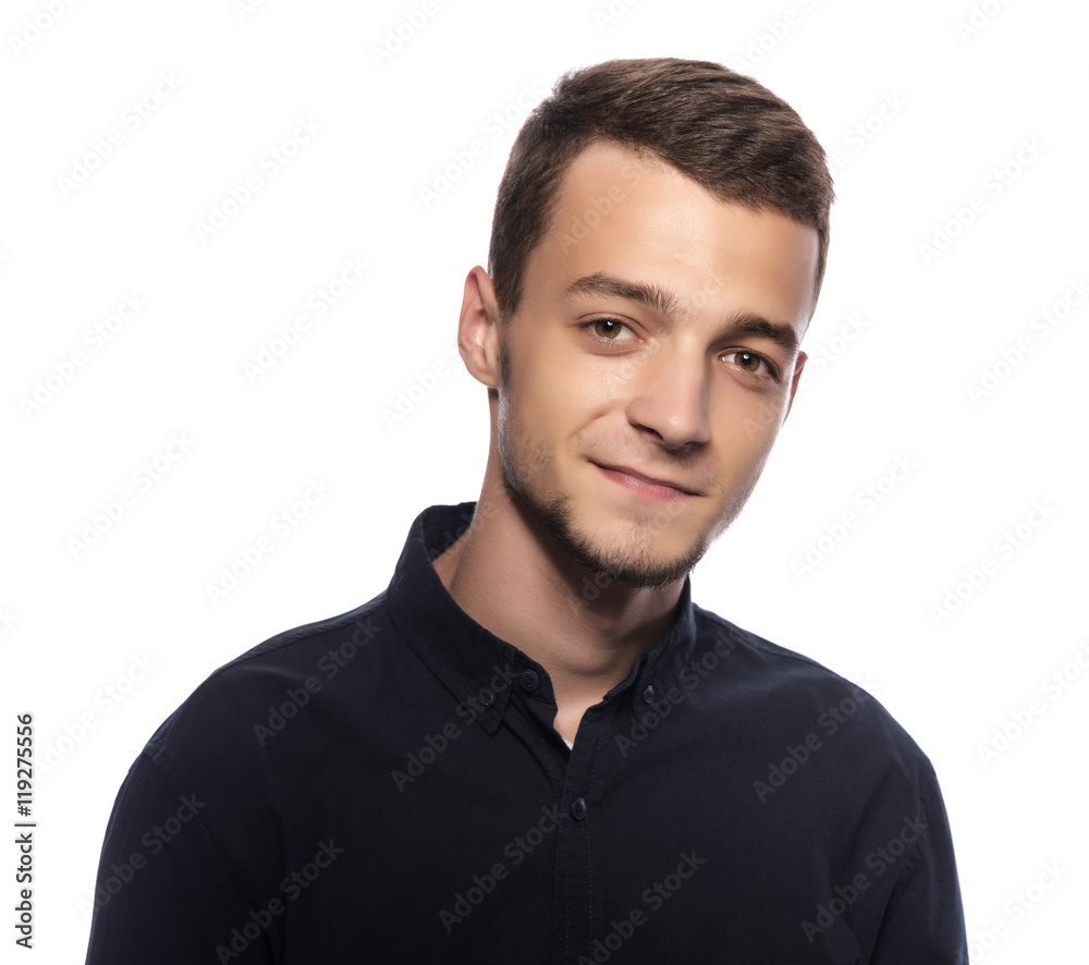 Young handsome man in a dark shirt. Young handsome man in a dark shirt.