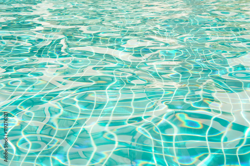 The sunlight on the surface of the water in the pool dimensional waves on water. © aboutnuylove