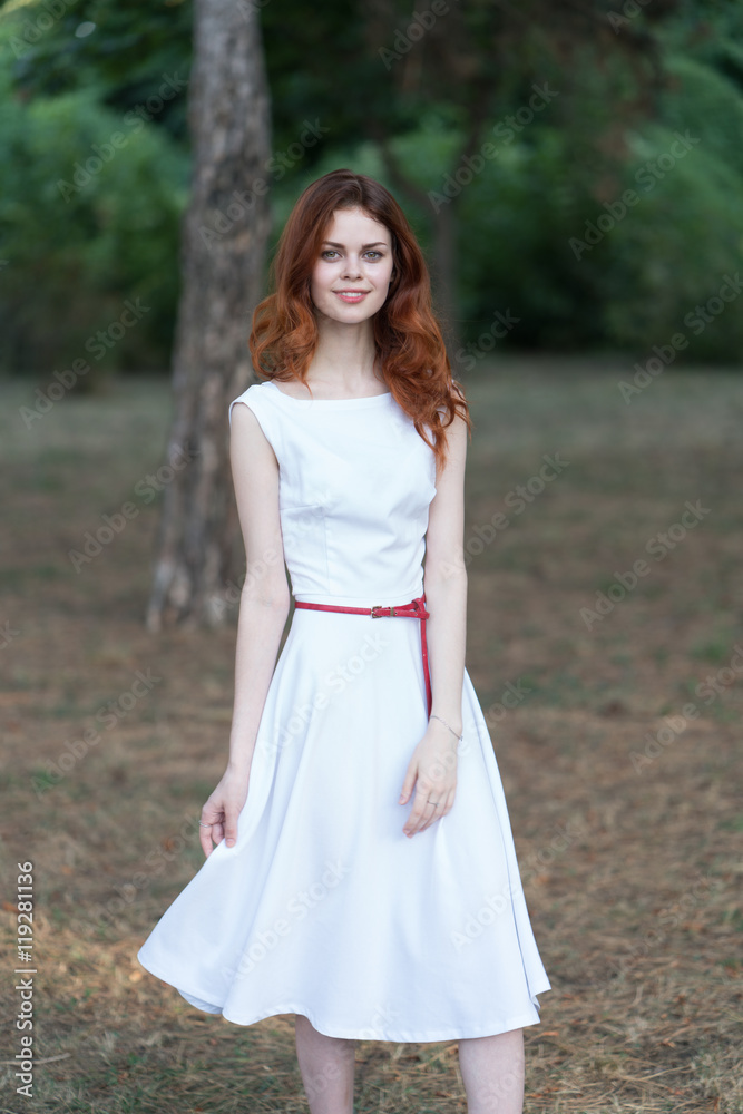 portrait of a beautiful young girl on nature
portrait of a beautiful young girl on nature