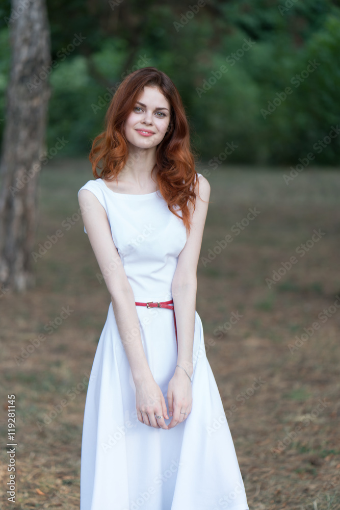 portrait of a beautiful young girl on nature

