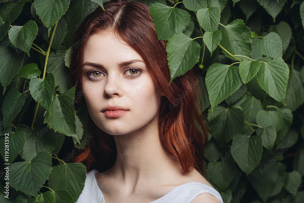 young woman, against background of summer green park
young woman, against background of summer green park