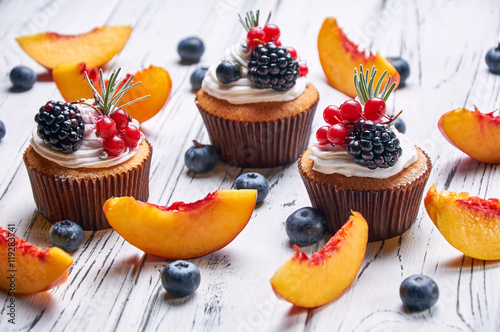 Luxury table with desserts. Fresh fruits and berries, pastries for children and adults.