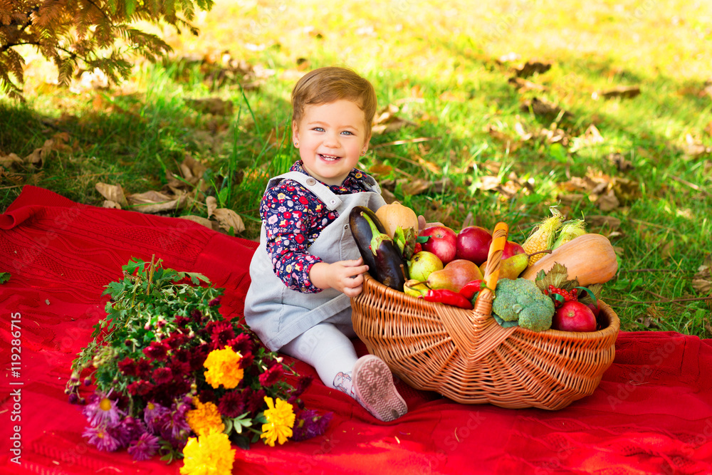 happy little child, baby girl laughing and playing in the autumn happy little child, baby girl laughing and playing in the autumn