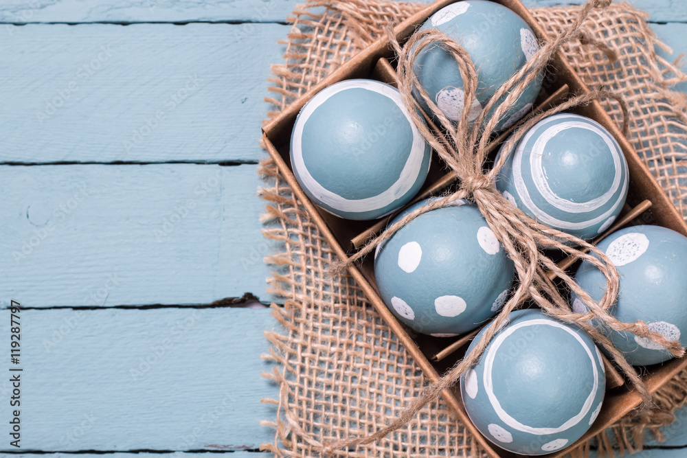 Easter concept with colored eggs on wooden background Easter concept with colored eggs on wooden background