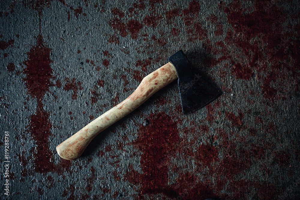 Naklejka premium Bloody ax lying on the floor