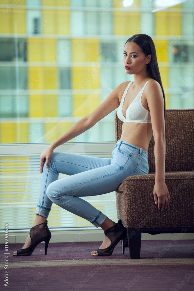 Prædike Diligence ubetalt Young Slim Beautiful Asian Woman Fashion Model Wearing Blue Jeans  Stock-foto | Adobe Stock
