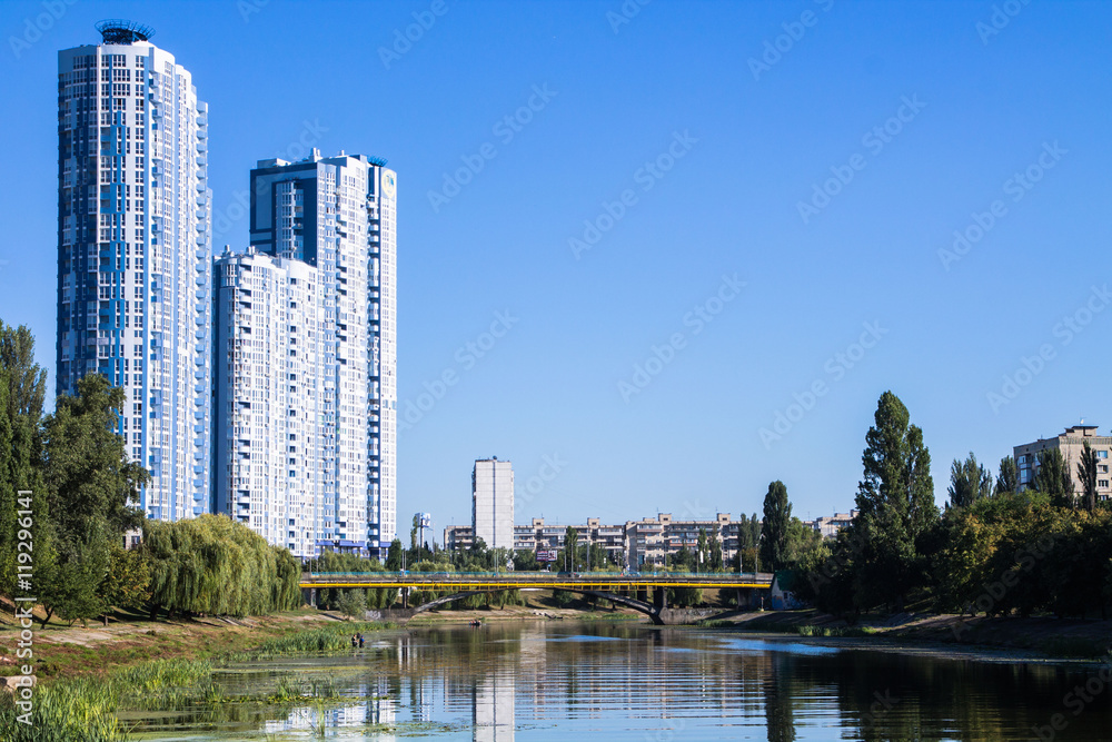Large buildings over the river.