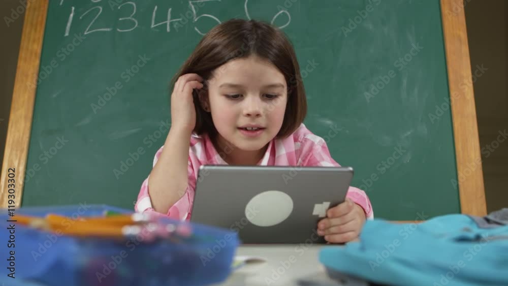 young girl using tablet