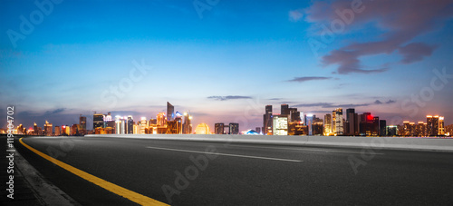 cityscape and skyline of hangzhou from empty road