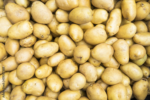 Fresh organic potatoes sold on market