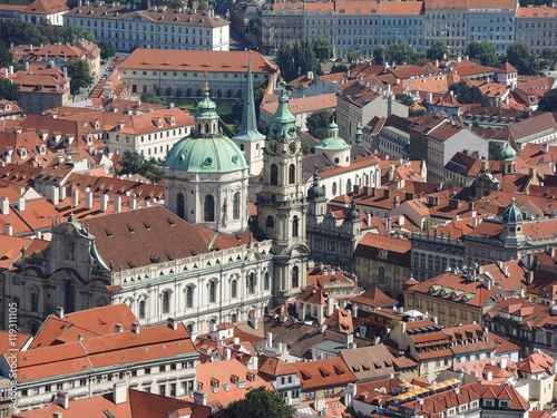 Prague is the capital of the Czech Republic. political and cultural center of Bohemia. Its historic center was included in the Unesco World Heritage . Roofs of the city.
