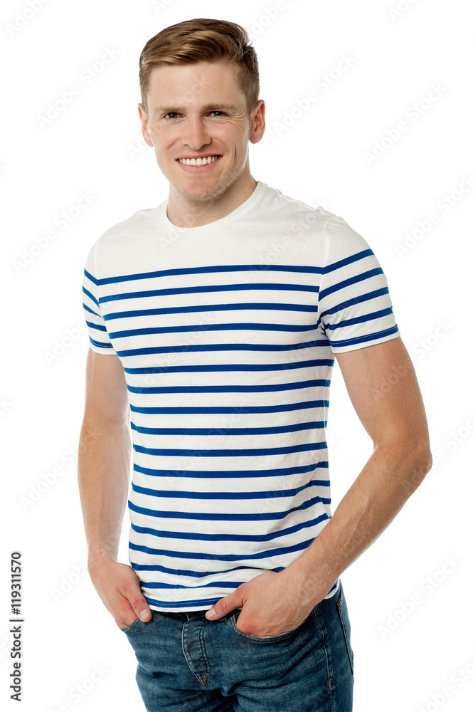 Casual young man posing to camera. Casual young man posing to camera.