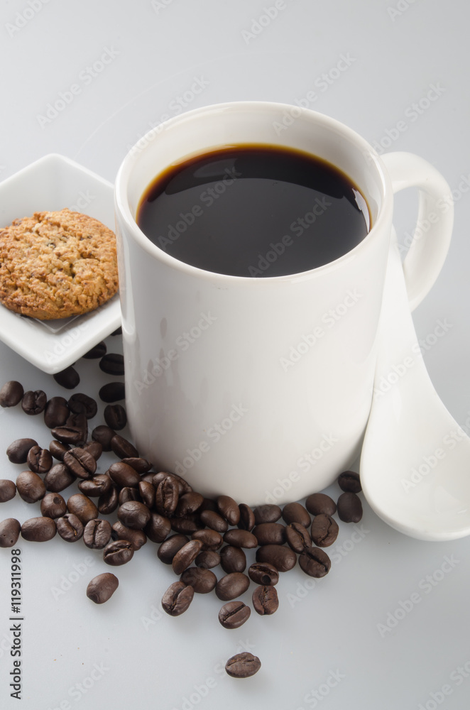 Obraz premium coffee or cup of coffee and cookie on background.
