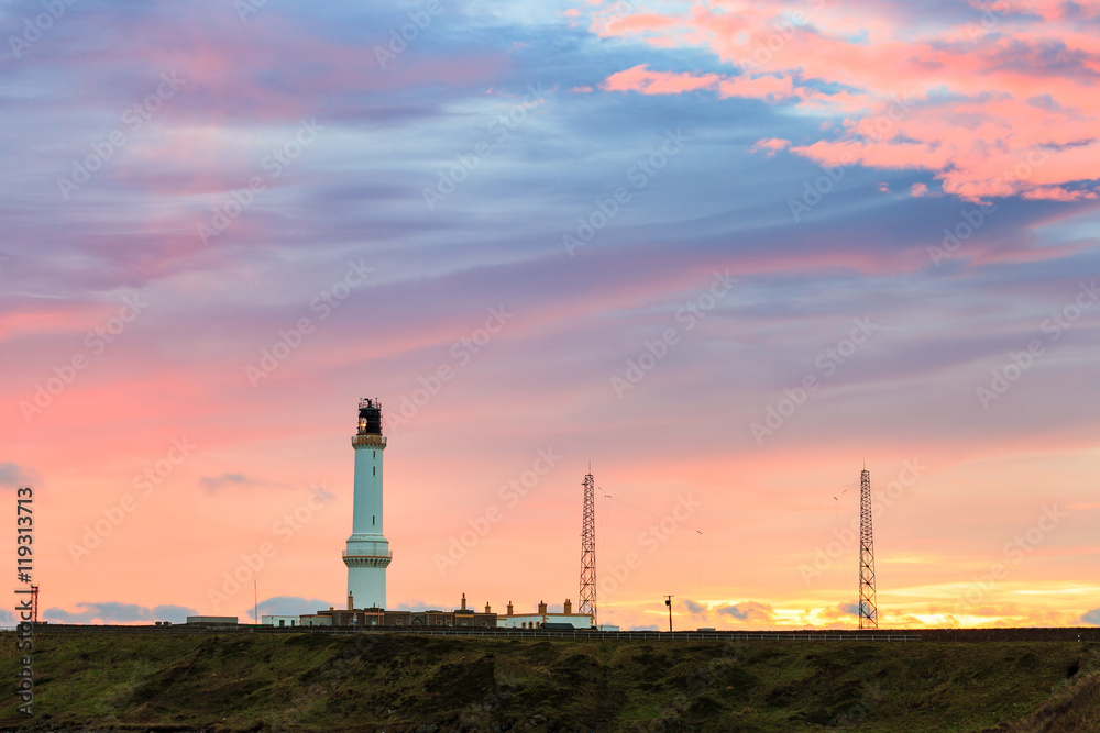 Girdle Ness lighthouse During Sunrise in Aberdeen, Scotland UK Girdle Ness lighthouse During Sunrise in Aberdeen, Scotland UK