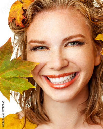 Autumn Woman Fashion Portrait. Beautiful Model Girl with colourf photo