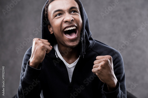 Excited African American man portrait photo