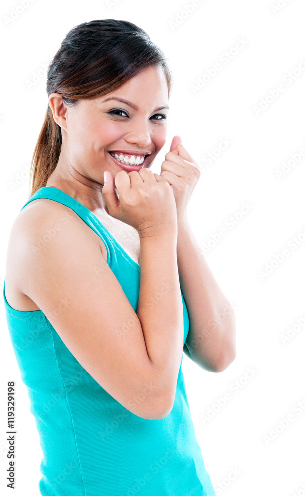 Happy young woman giggling with hands on face Happy young woman giggling with hands on face