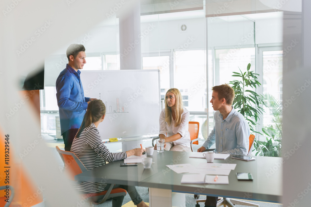 Defining the steps to corporate success. Business people working in