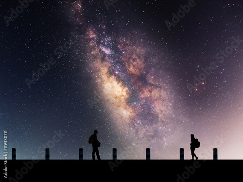 Galactic beautiful landscapes  travelers on the path that the Milky Way galaxy and the background light of the stars across the night sky.