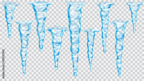 Set of translucent light blue icicles on transparent background. Transparency only in vector file