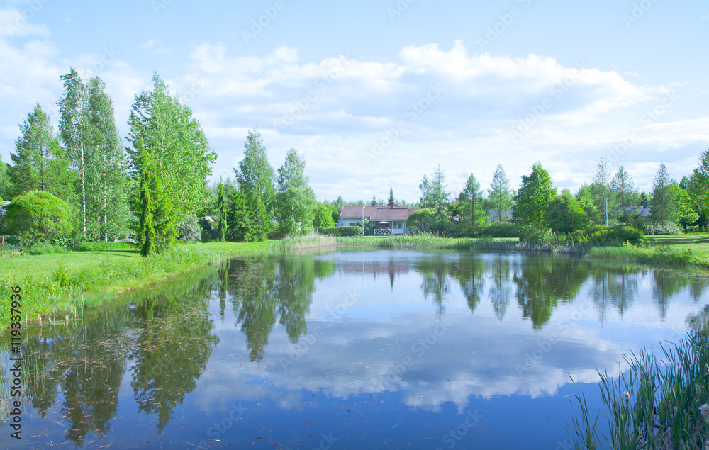 House on the shores of the beautiful pond House on the shores of the beautiful pond