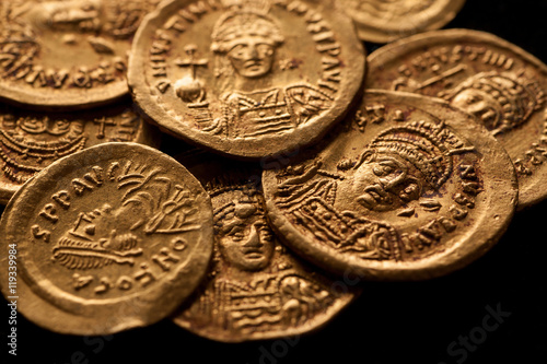 Ancient gold Byzantine coins with emperor portraits