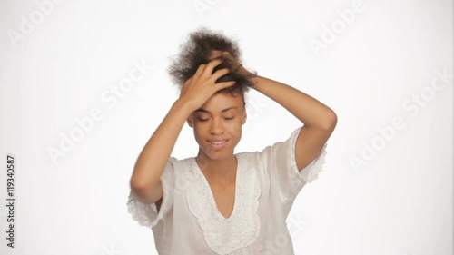 african american girl doing hair bun