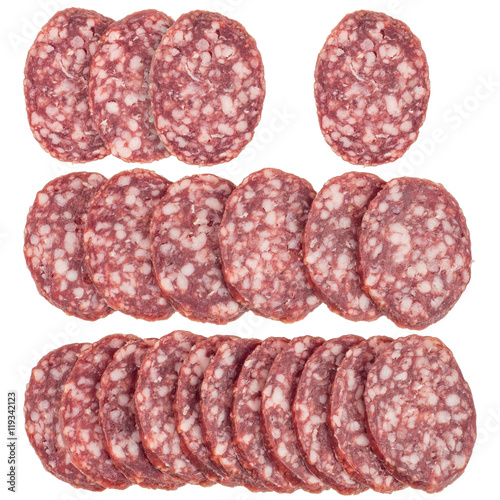 Slices of salami sausages isolated on a white background.