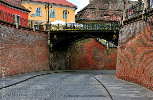 Liars bridge in the street of Sibiu old town, Romania photo