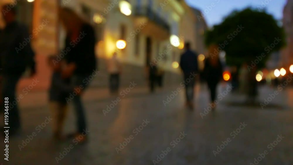 4K .Silhouettes of people on city street. Night blurred scene, Slider
4K .Silhouettes of people on city street. Night blurred scene, Slider