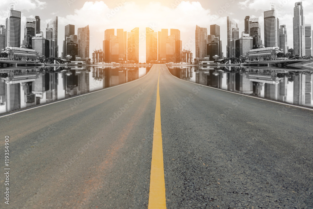 Lane blacktop in the colorful city with beautiful skyscrapers background. Lane blacktop in the colorful city with beautiful skyscrapers background.