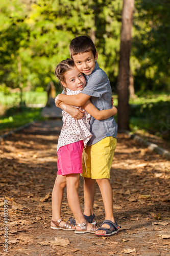 Happy sister and brother together in the park © zing