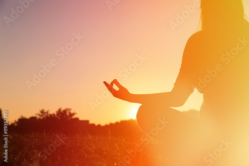 Fototapeta Naklejka Na Ścianę i Meble -  serenity and yoga practice at sunset