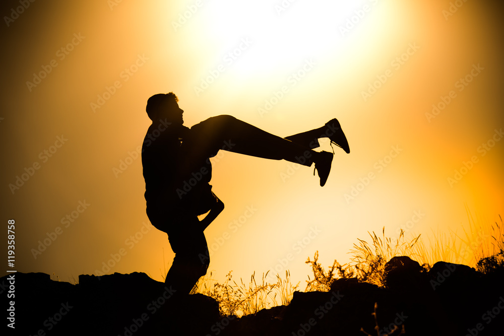 Silhouette taekwondo man at morning.