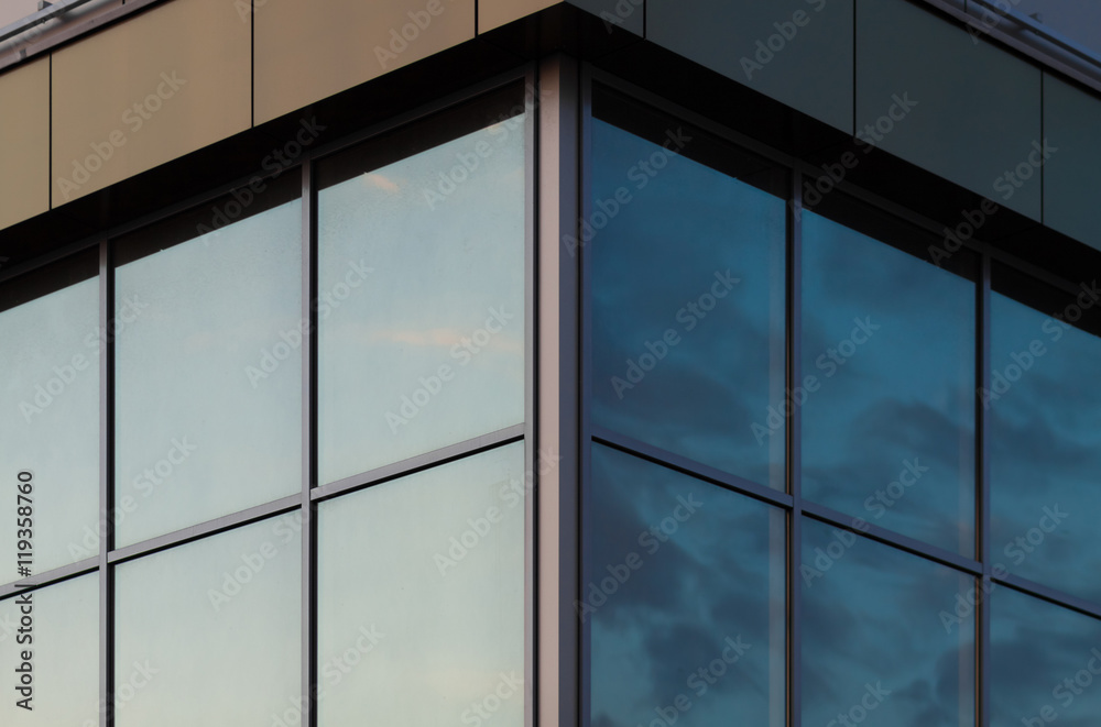 Sky reflected in a glass facade Sky reflected in a glass facade