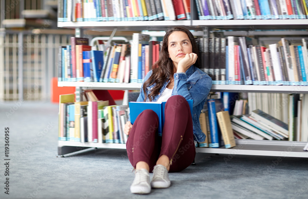 high school student girl reading book at library high school student girl reading book at library