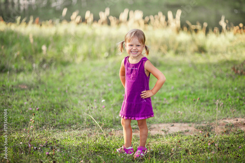 Child happy outddoors. photo