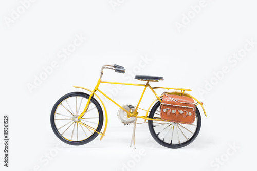 hand made yellow bicycle model isolated on white background