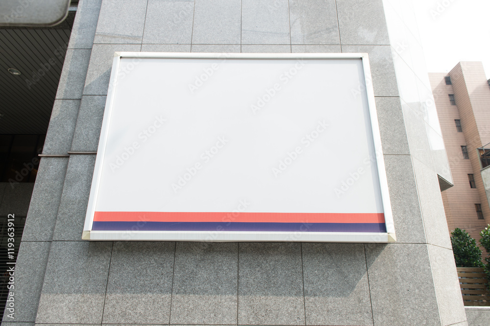 Fototapeta premium Large blank billboard on a street wall, banners with room to add your own text